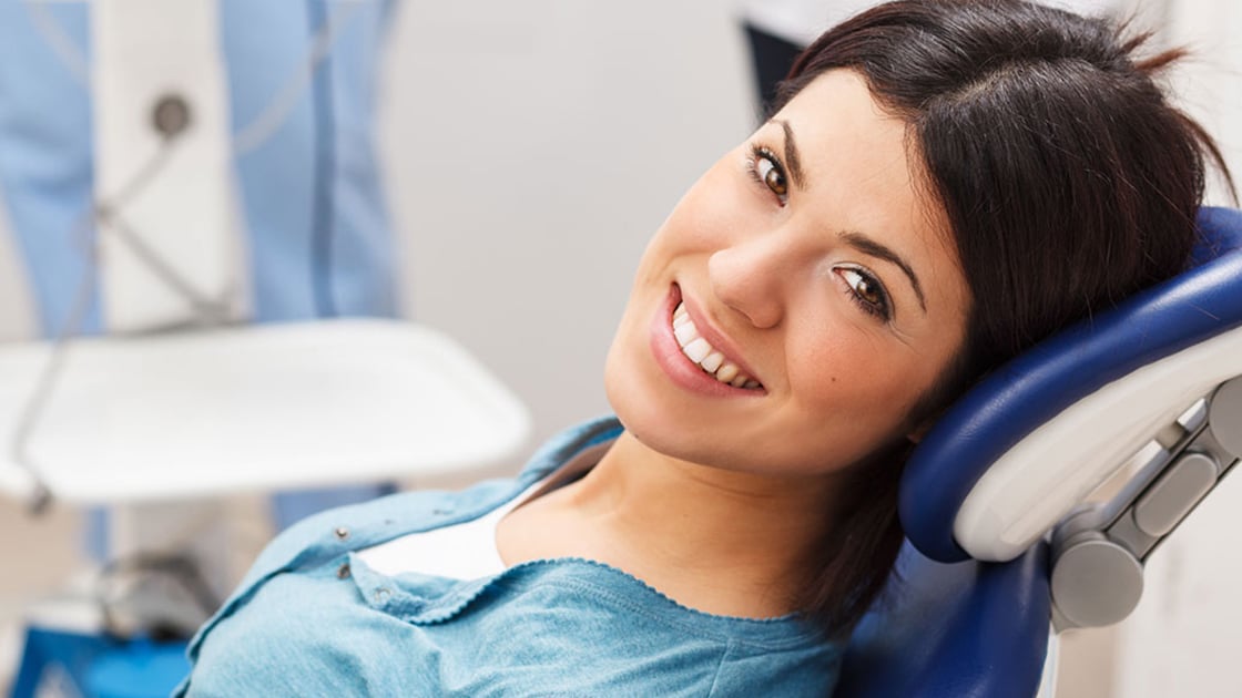 Woman smiling in chair