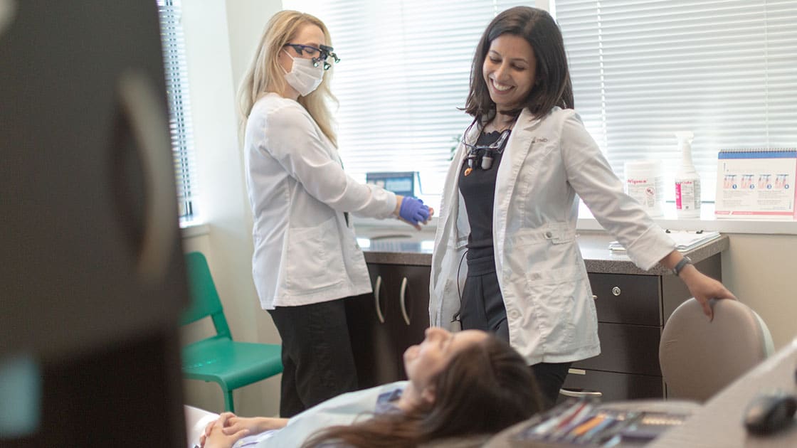 doctors ready to start dental exam